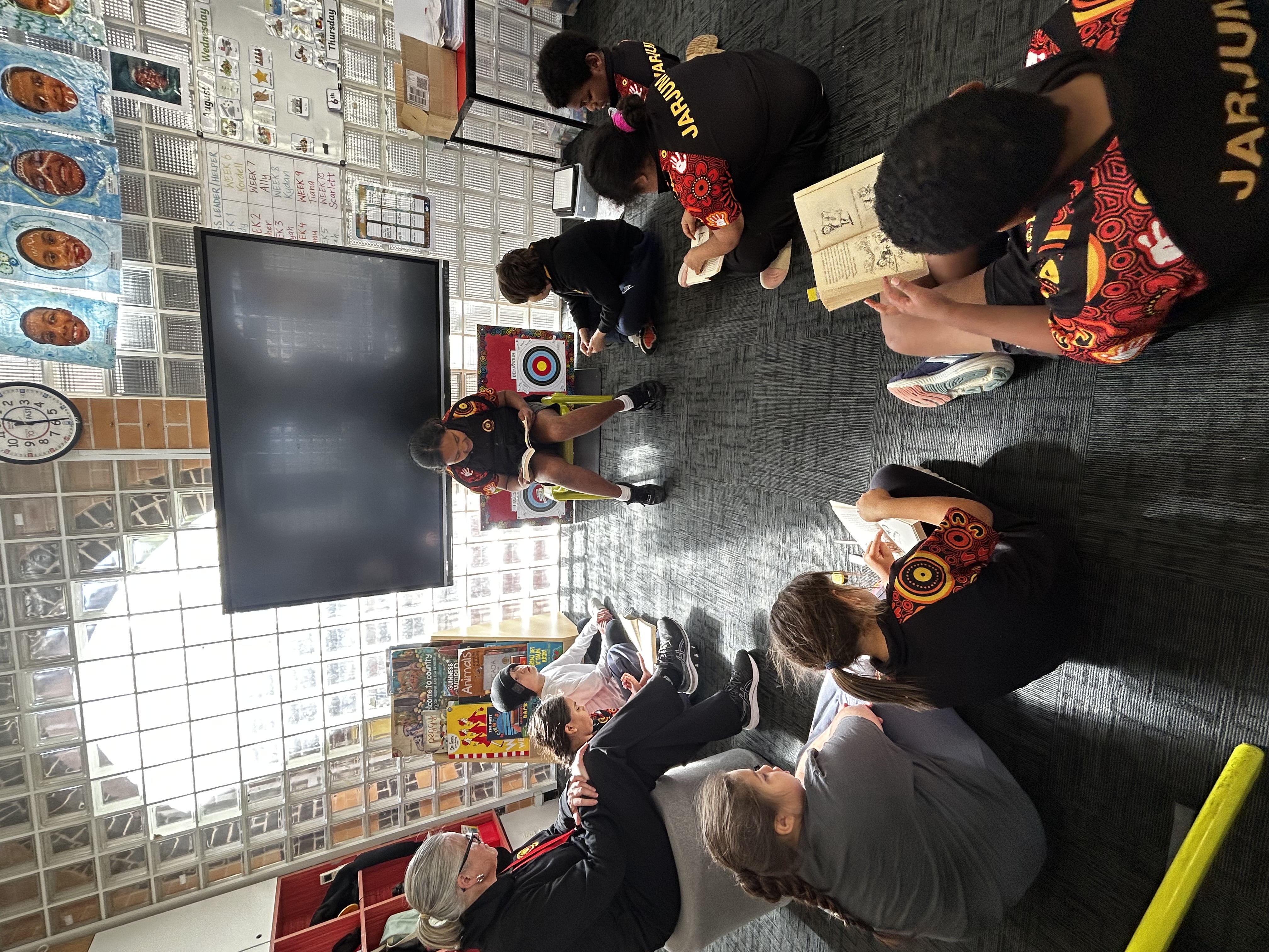 Jarjum students and staff sharing a classroom reading session