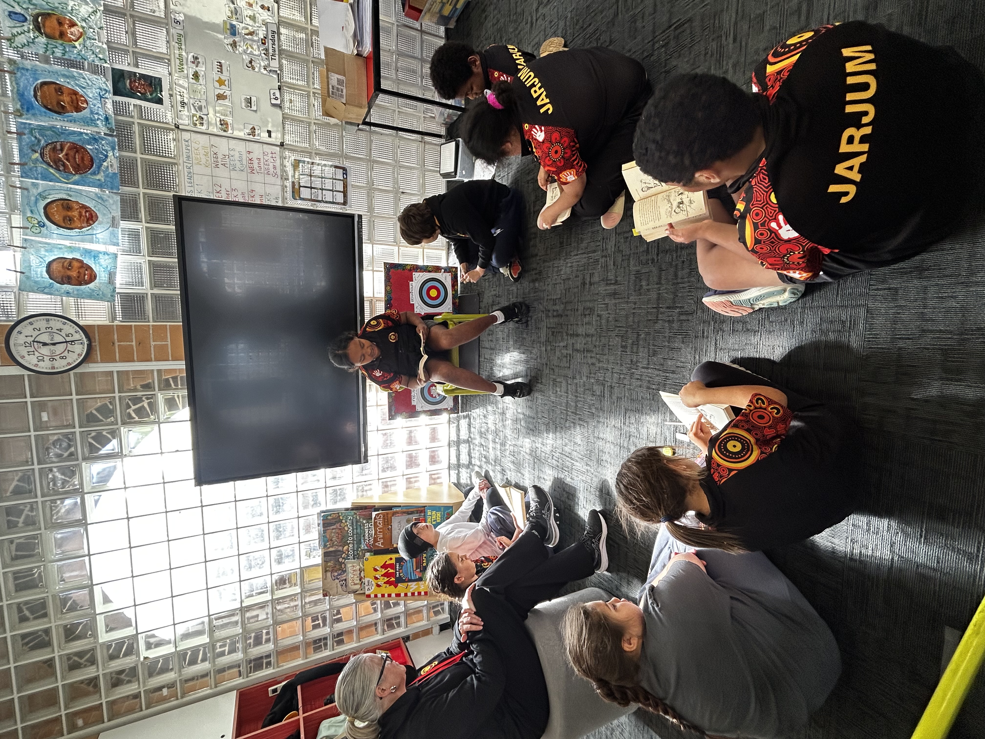 Jarjum students gathered in a classroom reading circle