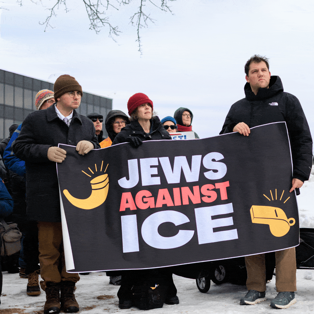 Rotating photos of people taking action at Jews Against ICE actions in Boston and Minneapolis.