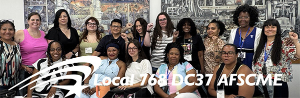 Image of DC37 members with their banner marching on May 1 in NYC