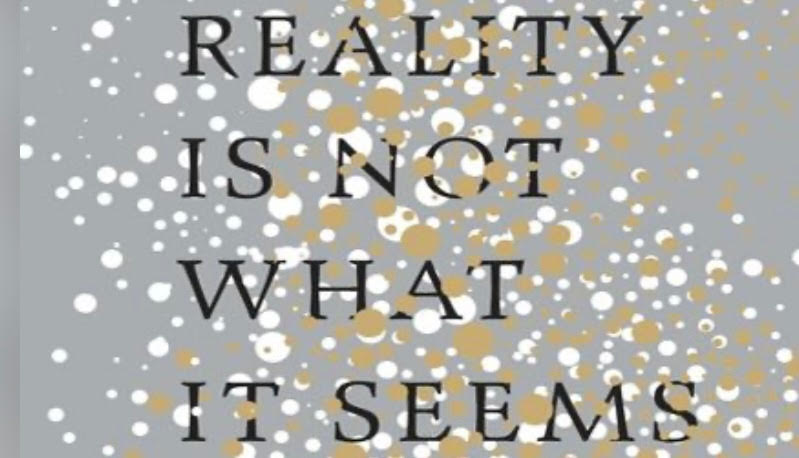 a gray box filled with white and yellow dots with text that reads 'reality is not what it seems'