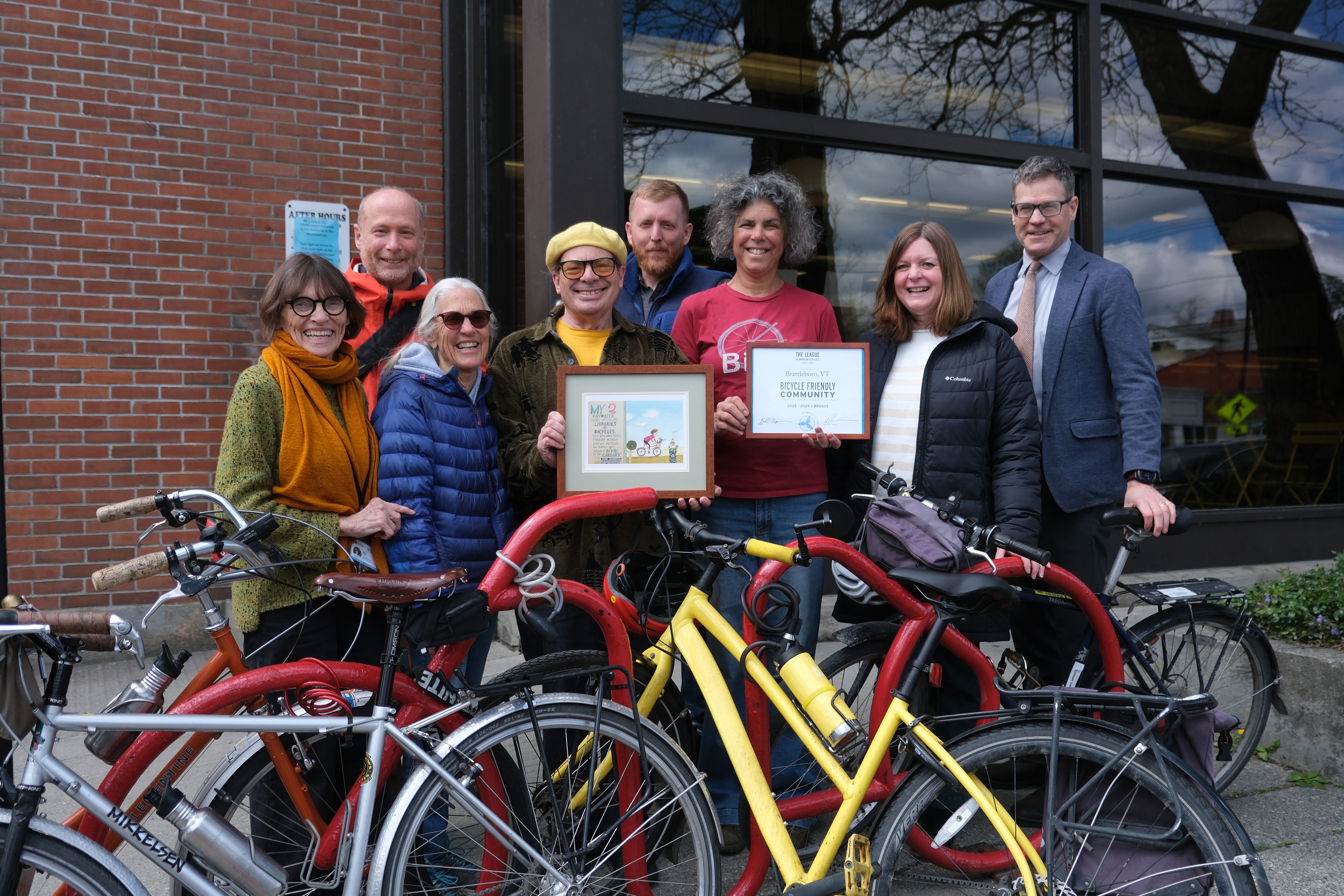 Members of BCAT and town employees pose with their framed award
