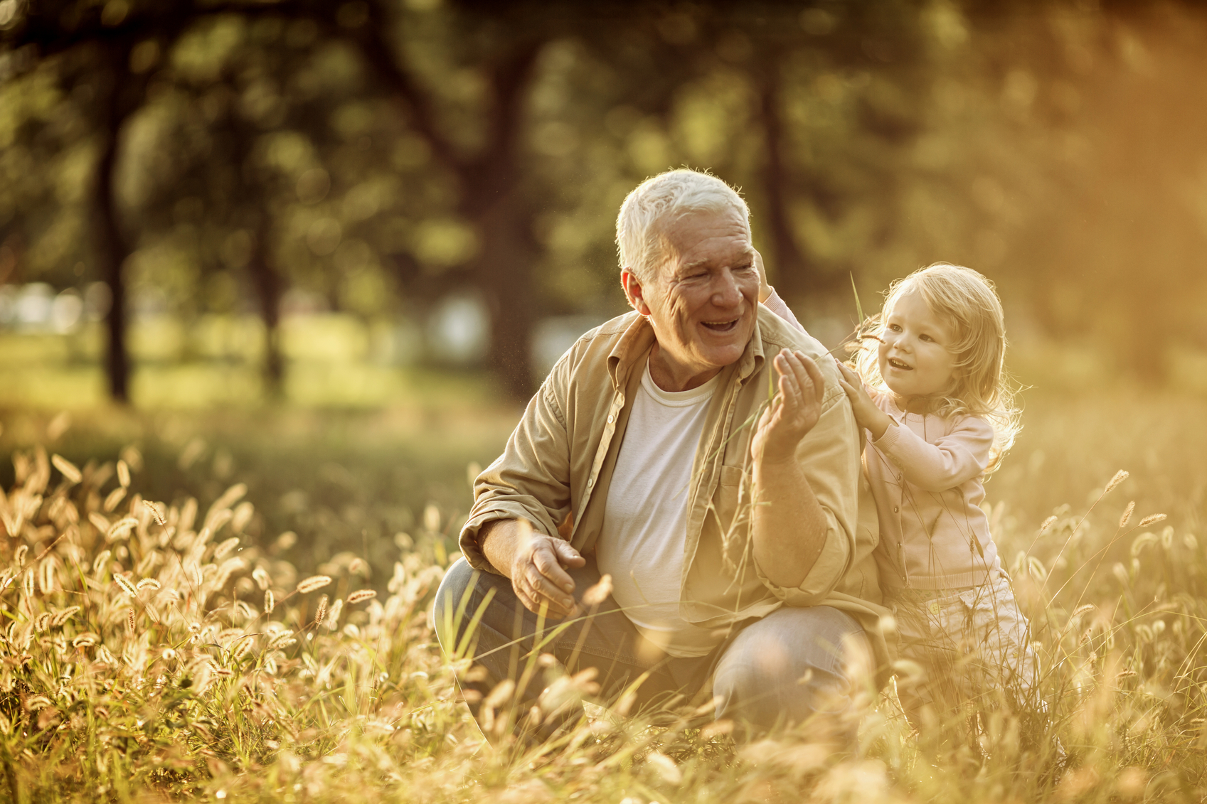little girl playing with old men