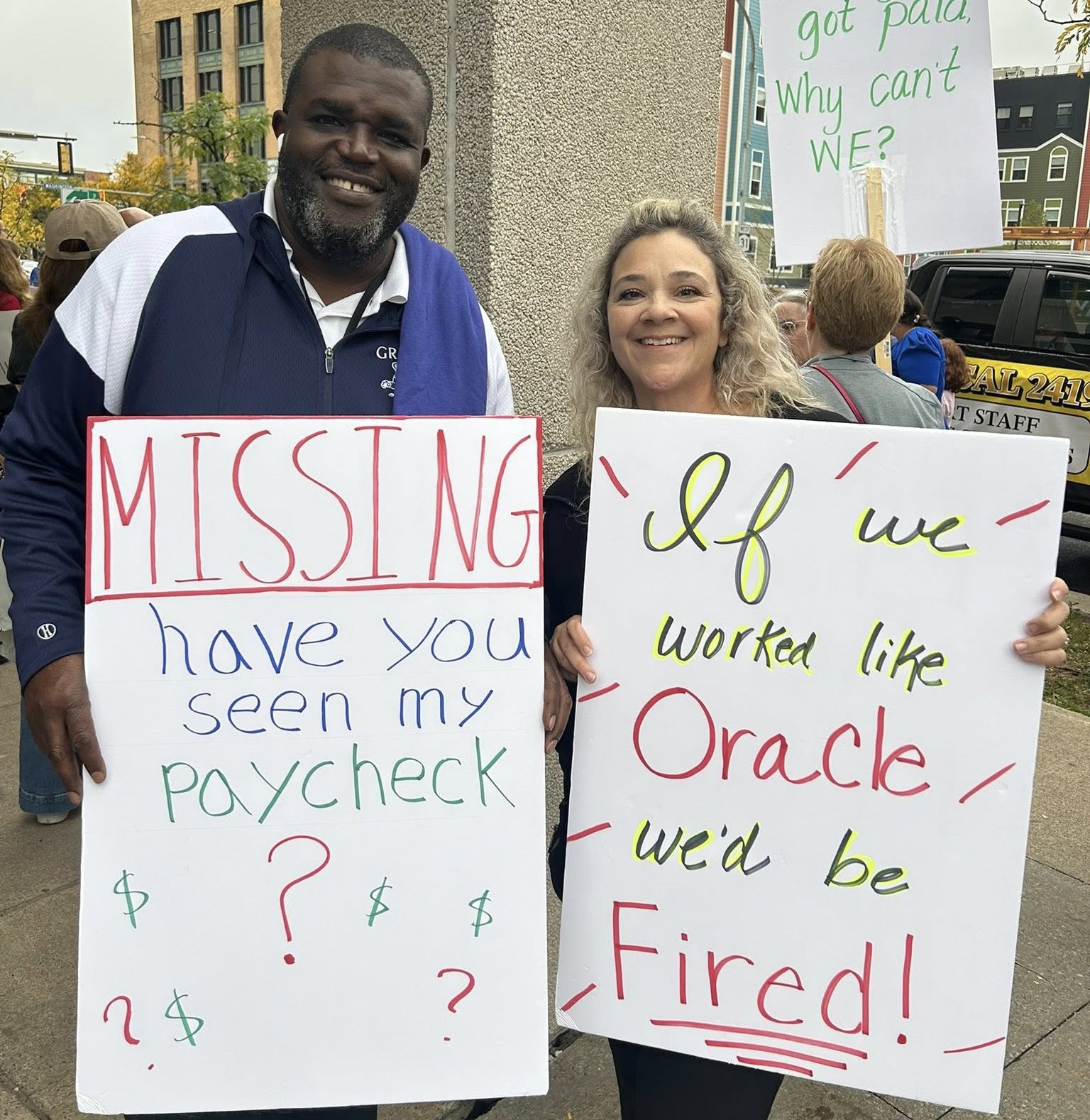people with signs: "If we worked like Oracle we'd be
fired!"