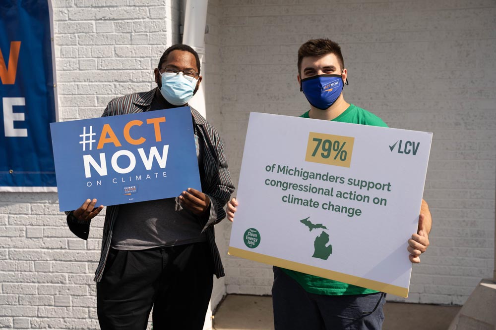 Volunteers with Signs