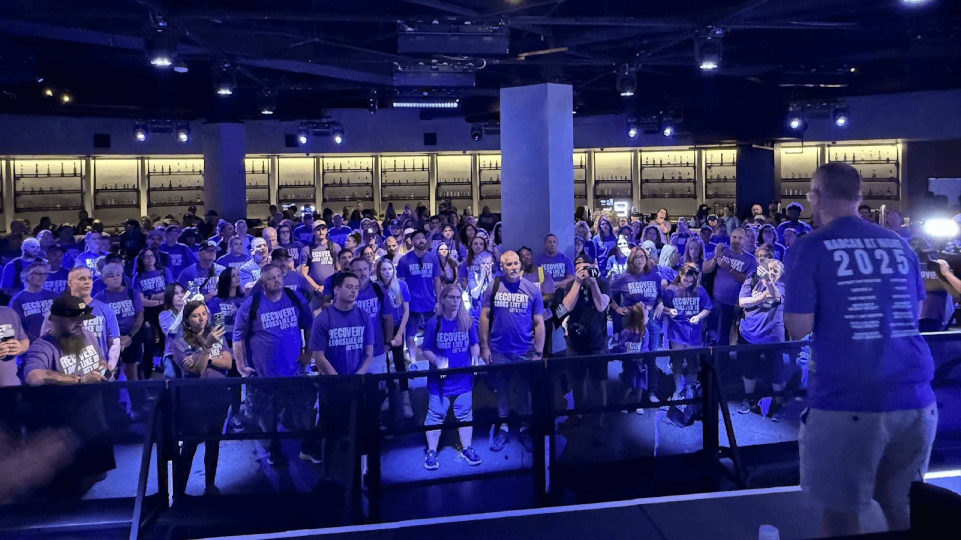 Crowd of volunteers preparing for Narcan at Night 2025