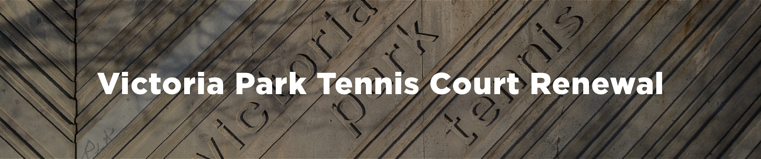 A photo of the concrete wall at the tennis courts that reads "Victoria Park Tennis" with the overlaid text "Victoria Park Tennis Court Renewal"