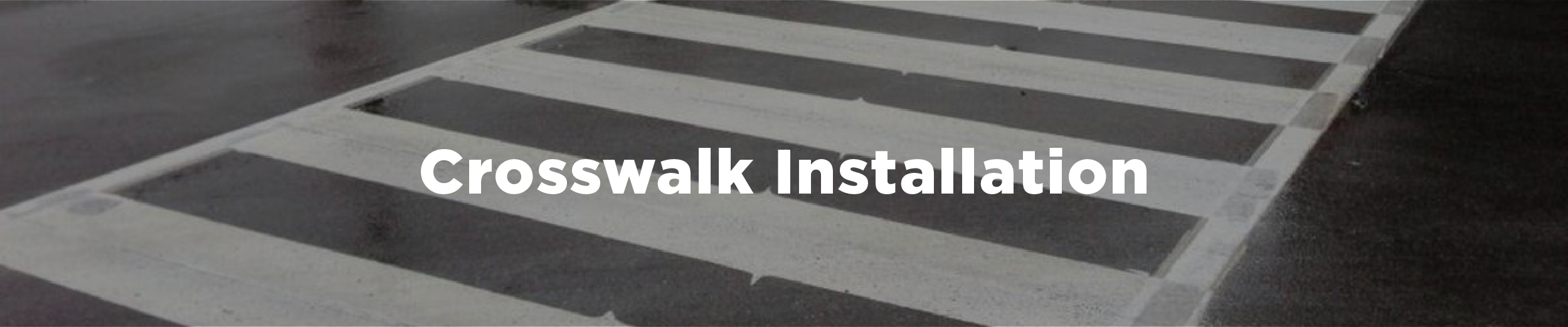 An image of the crosswalk at Herkimer St and Locke St S with the overlaid text "Crosswalk Installation"