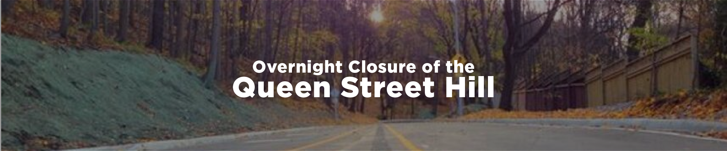 An image of the Queen Street Hill looking up toward the Escarpment in the early fall with the overlaid text "Overnight Closure of the Queen Street Hill"