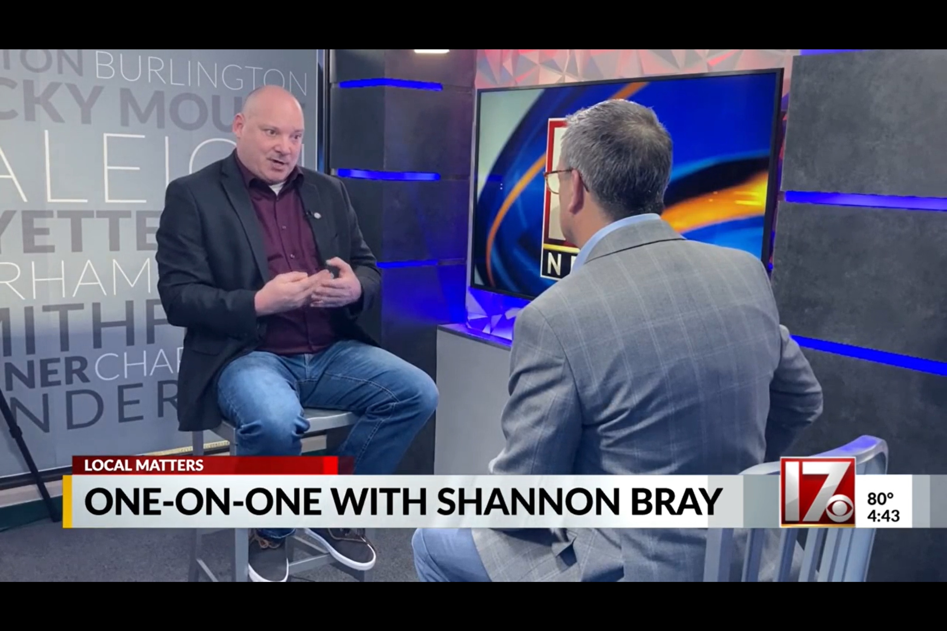 Shannon Bray speaking in a television interview