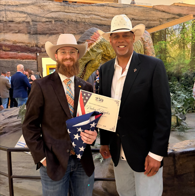 Paden Hagler and State Senator Ant Thornton attended this year's 250 Flags event honoring New Mexicans whose everyday service makes our state stronger.
