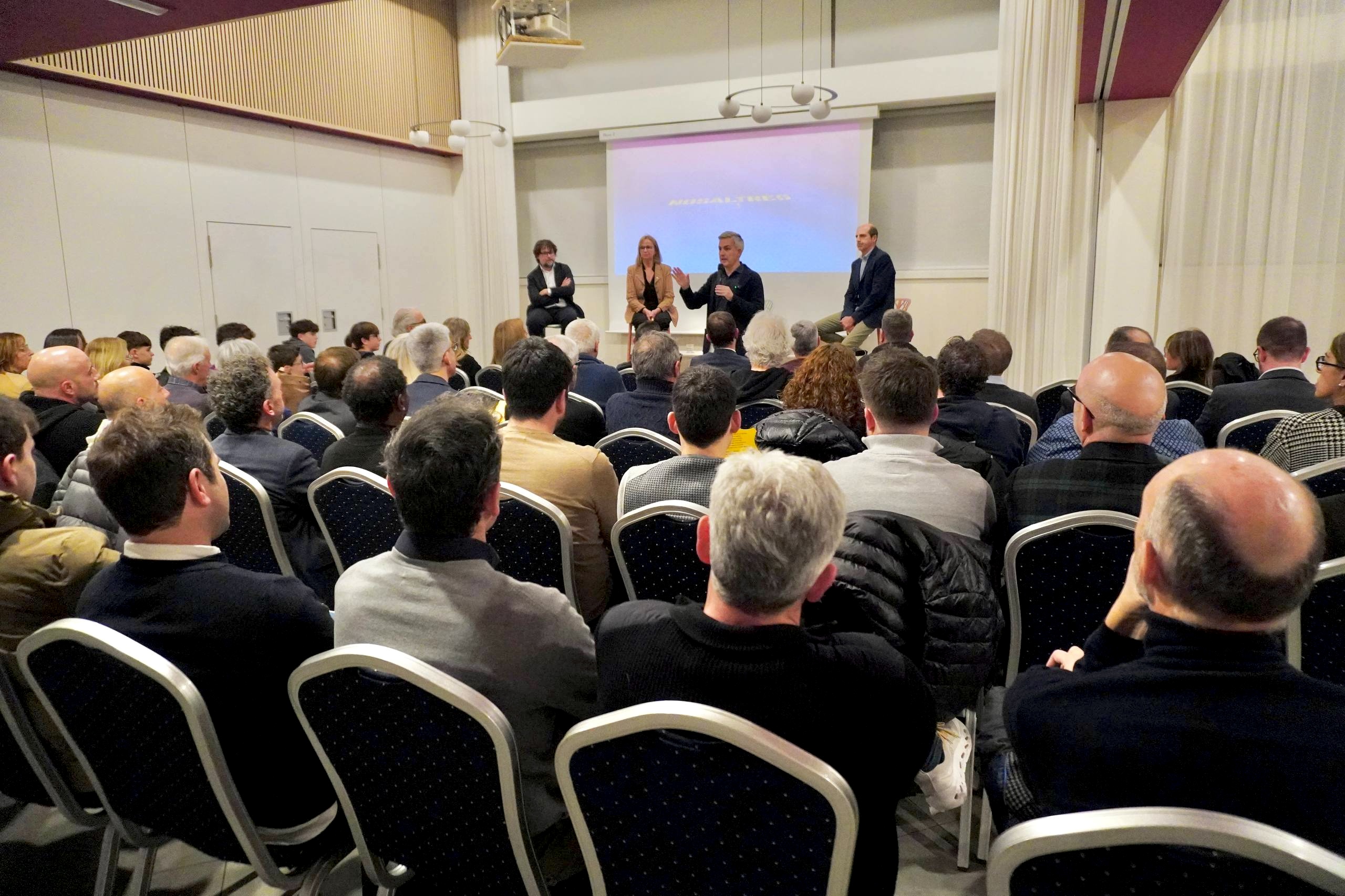 Ricard Font, Gemma Amat, Víctor Font i Carles Ordiales, durant l'acte celebrat a Girona.