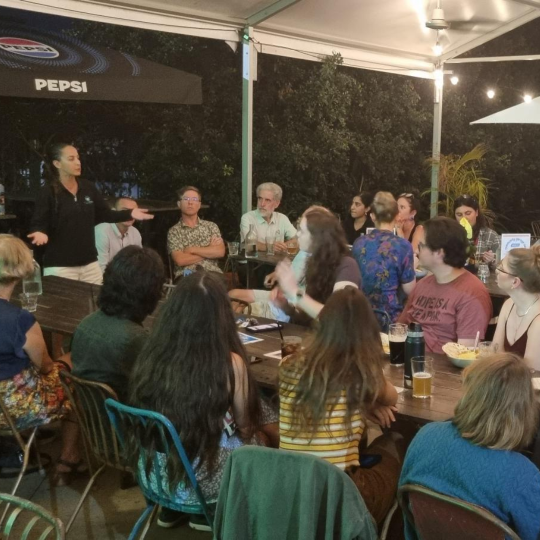 People sitting around a table at the last Green Drinks