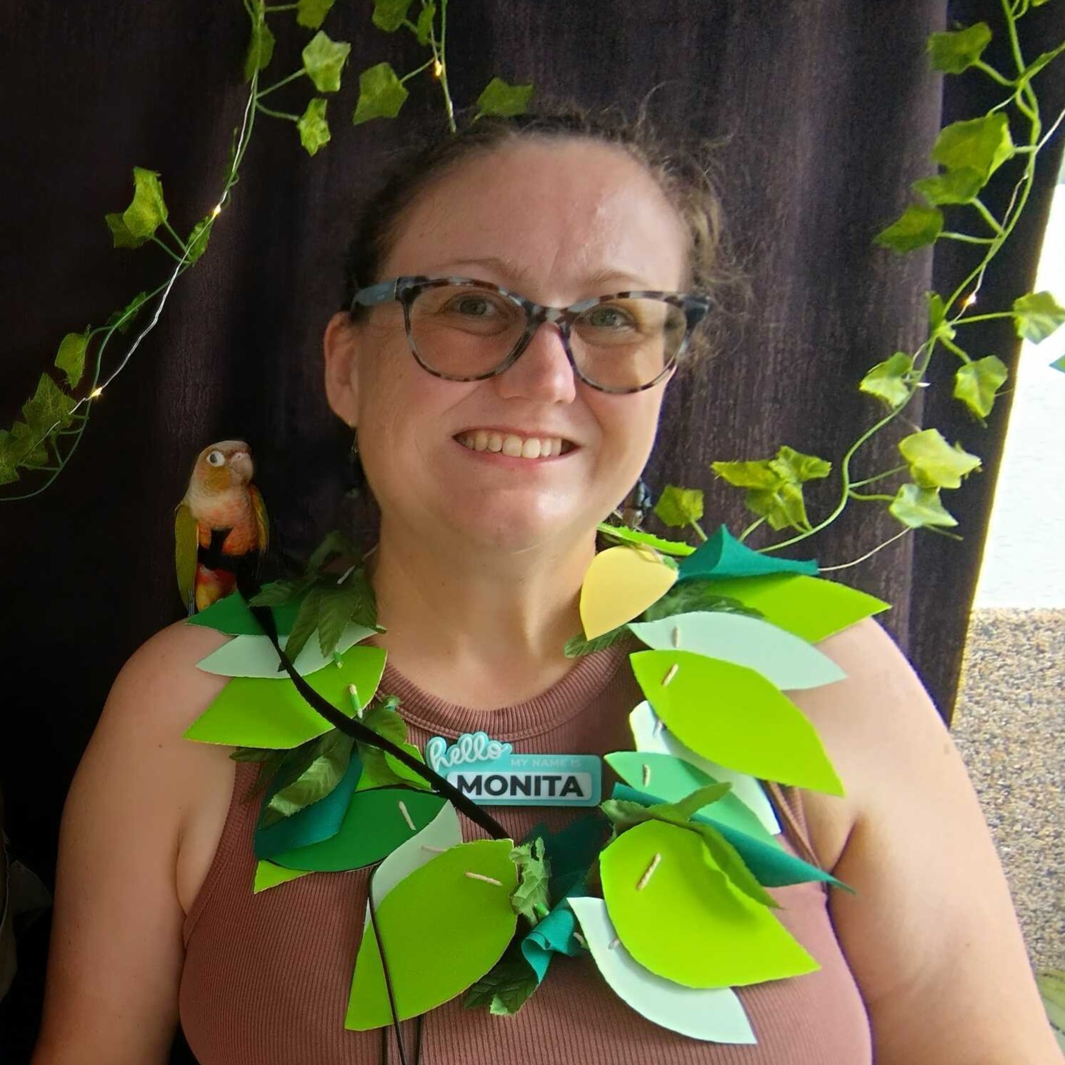 Monita with her parrot, Sassy