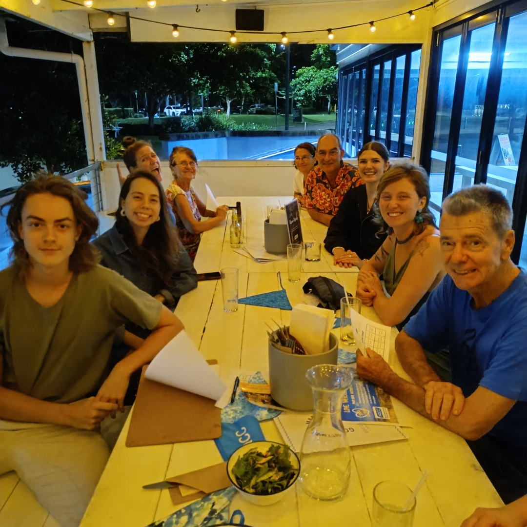 Group of volunteer sitting around a table