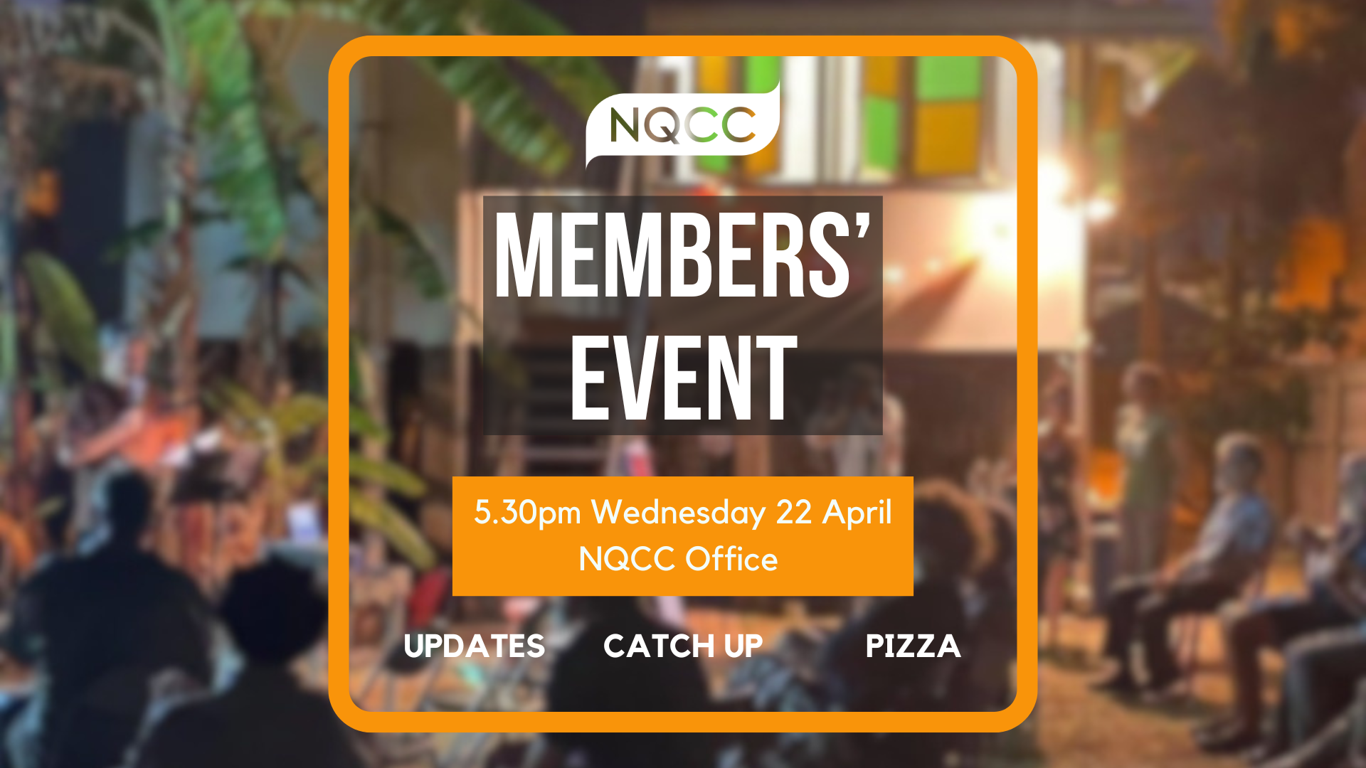 A picture of a meeting in the NQCC backyard. People sitting in chairs, fairy lights across the building