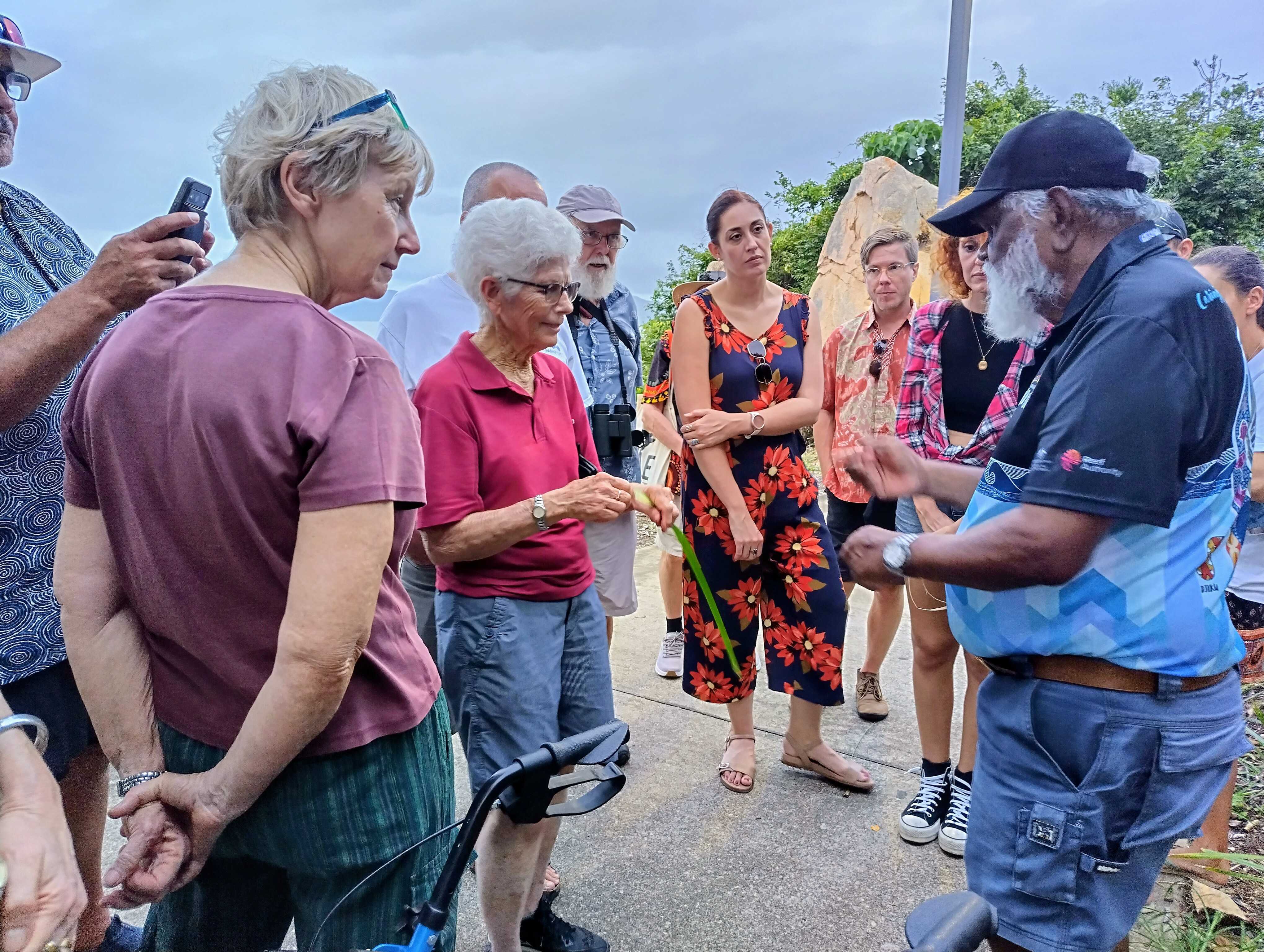 Uncle Russell speaks to a small group of people