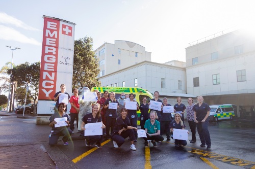 Photo of Emma and her colleagues