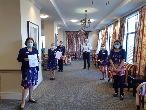 Photo of Roma and her colleagues