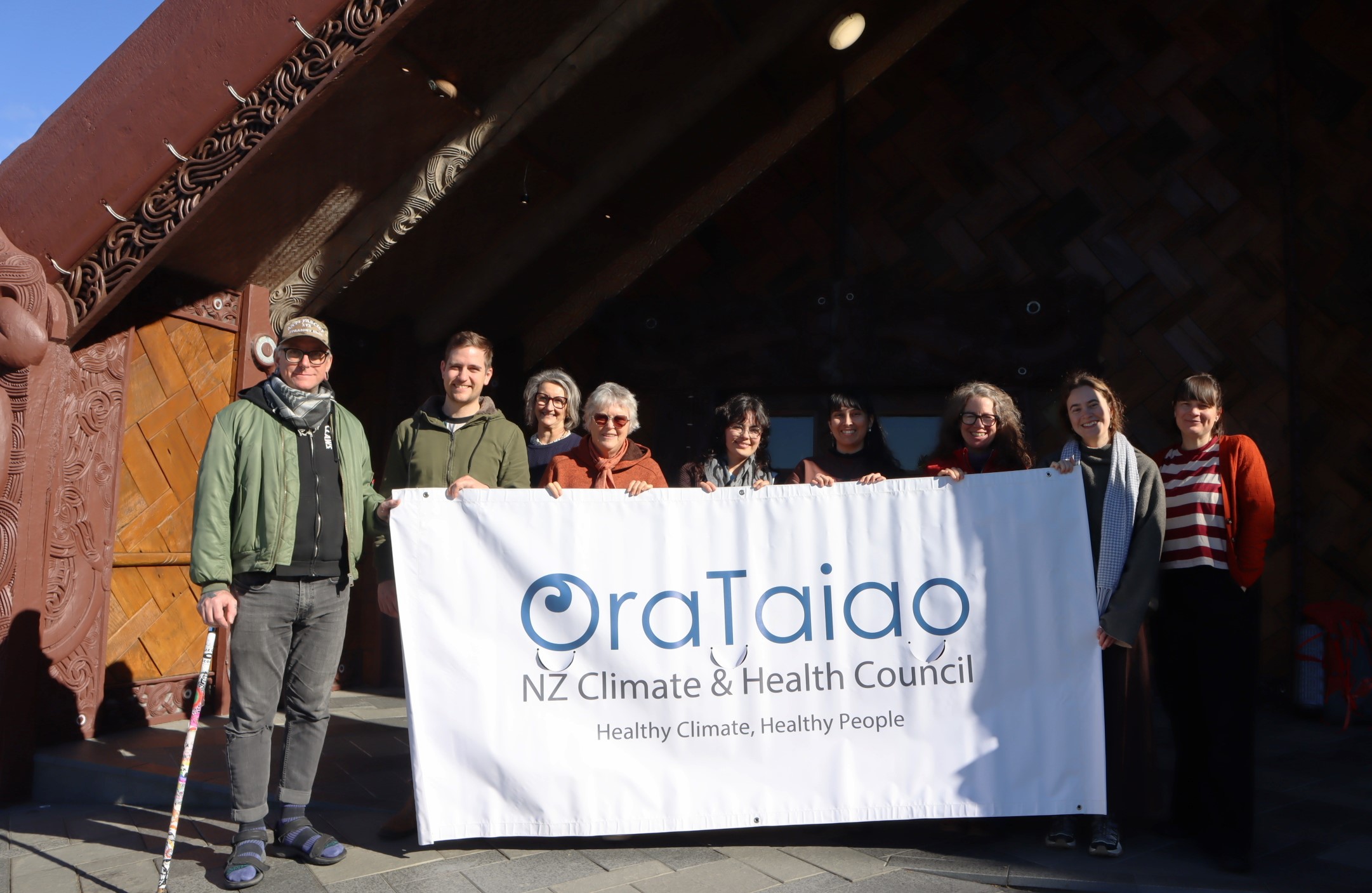 OraTaiao members outside marae in Tāmaki