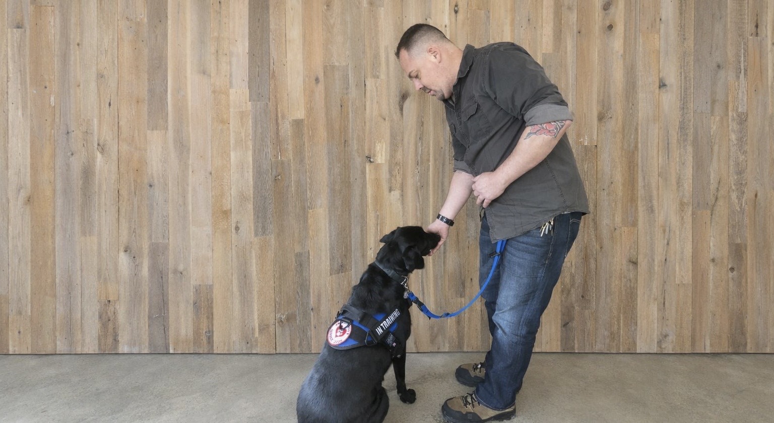 Veteran working with his future service dog