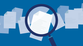 loupe avec des papiers