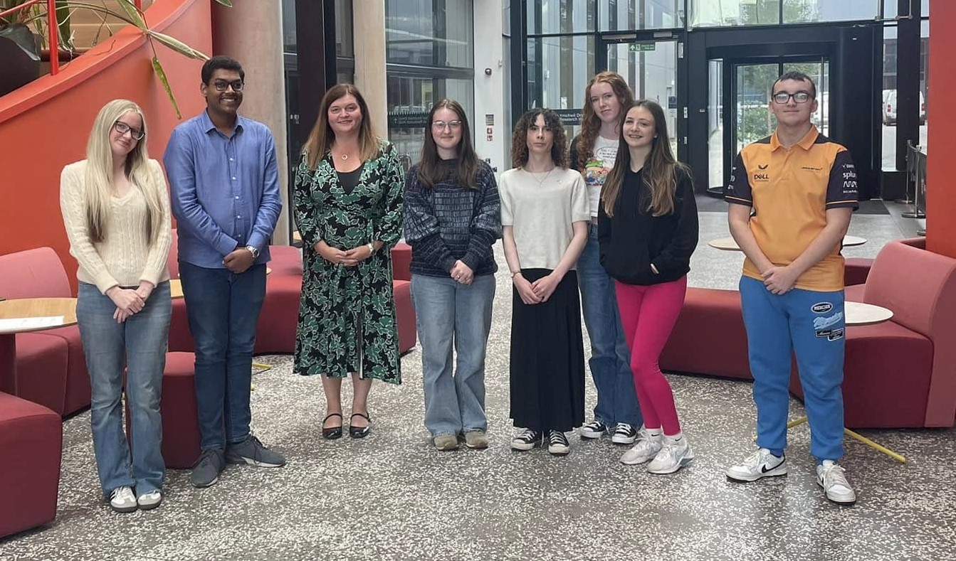 sioned and a group of students