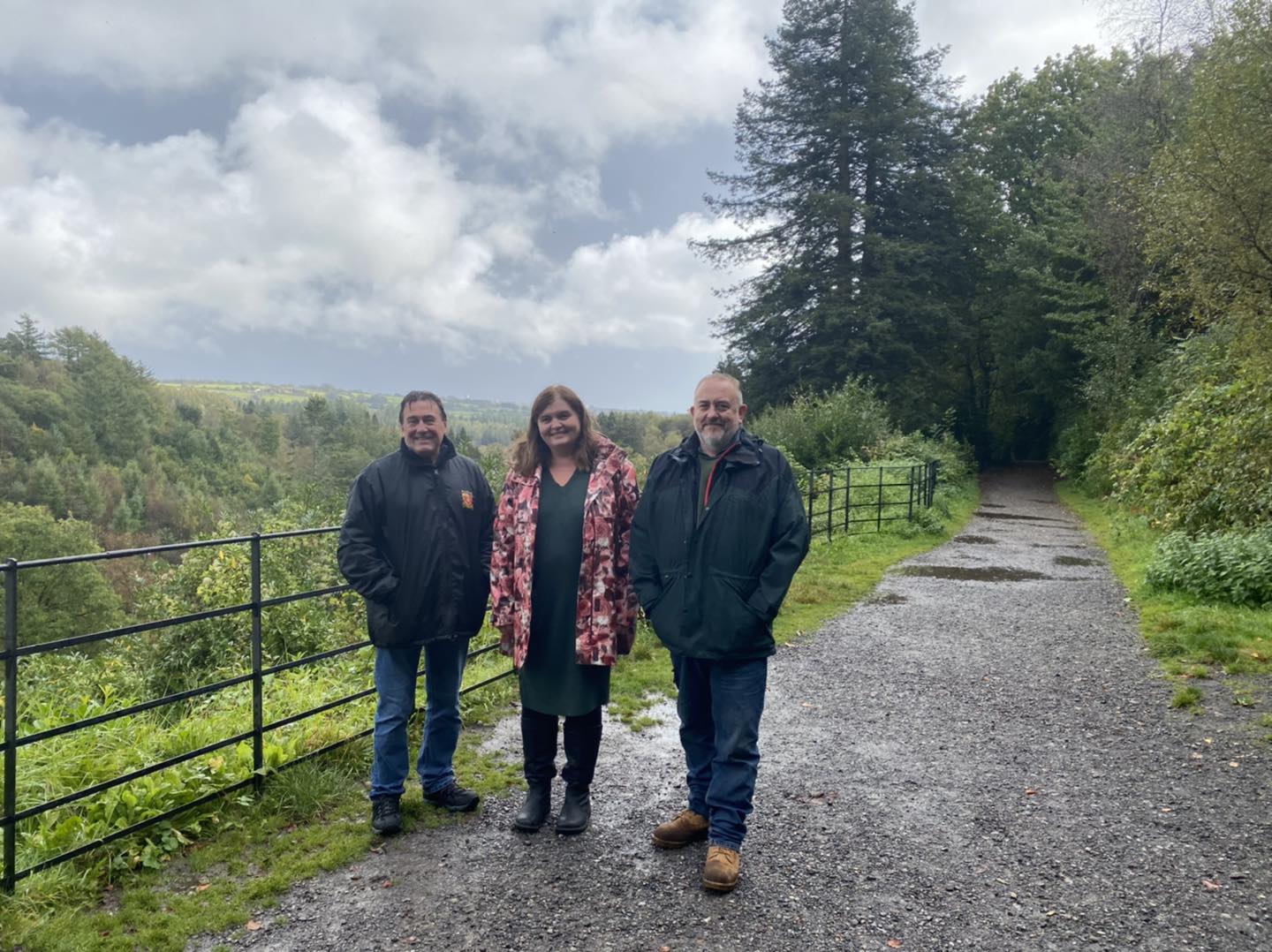 Sioned and two men above the valley