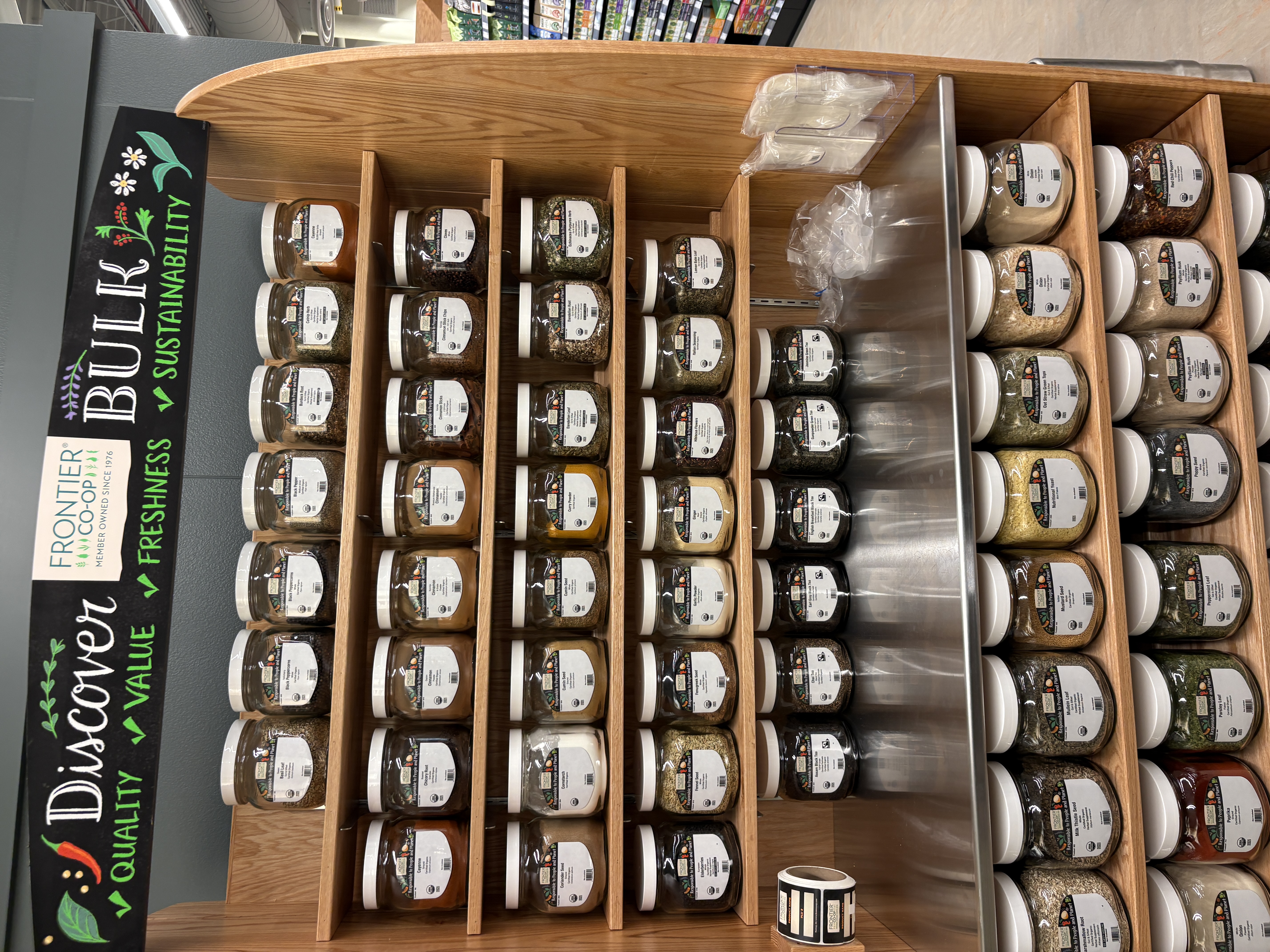 Bulk bins with grains, beans, and spices