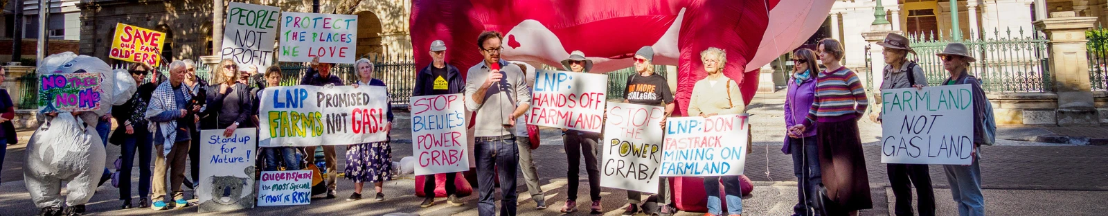Anthony Gough from QCC speaks to protestors about the Queensland government's dangerous State Development Bill
