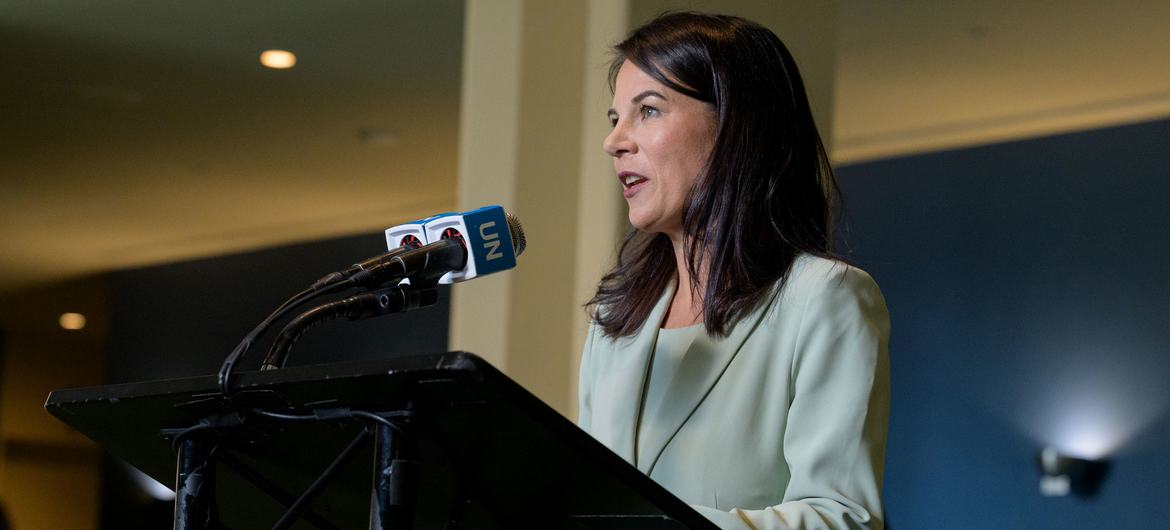 Assembly President Baerbock speaks to reporters outside the General Assembly Hall.