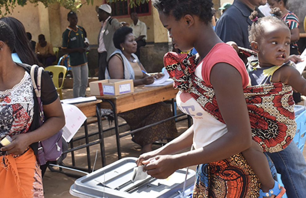 A Malawian woman casts her vote. 