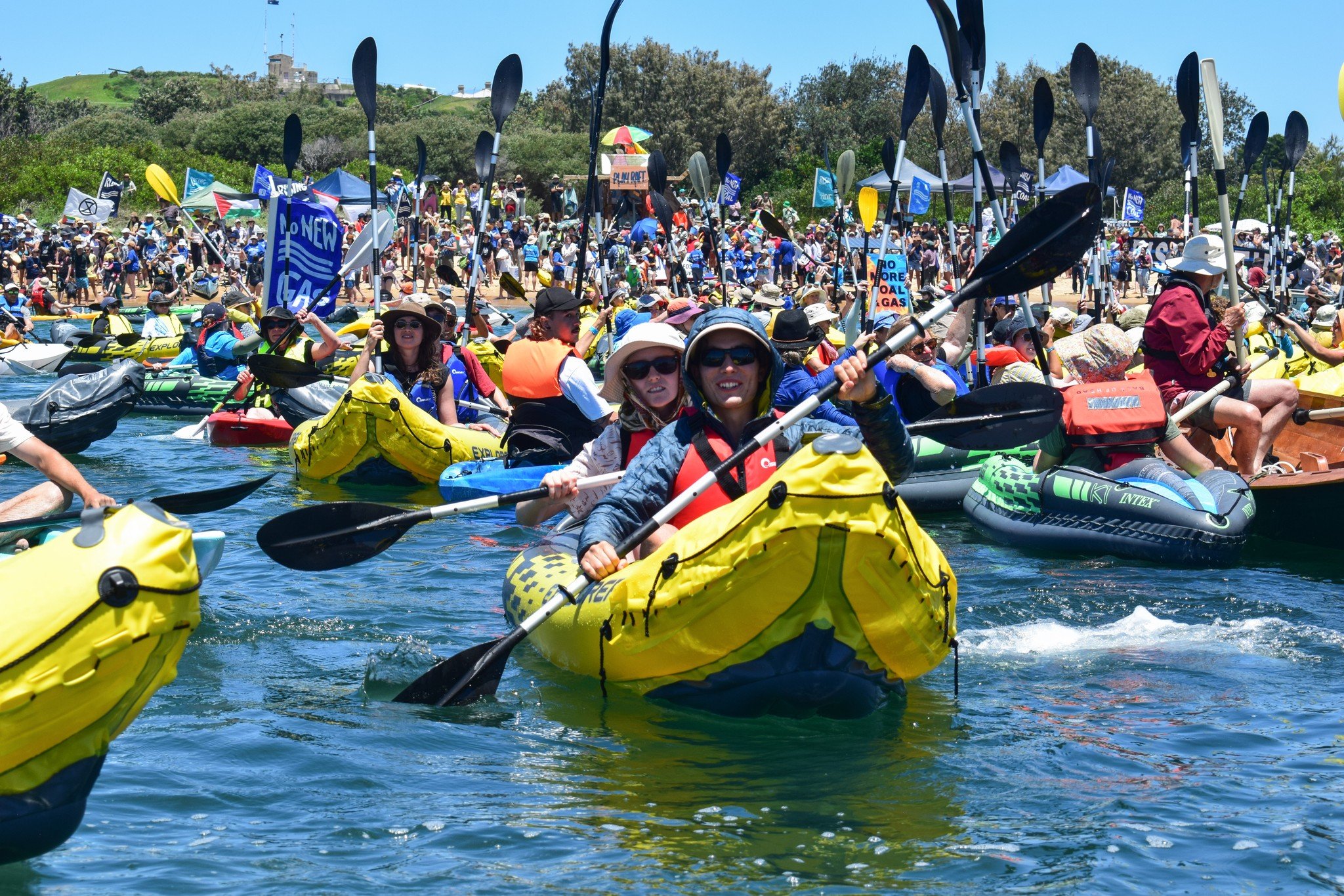 People in canoes on the water at the People's Blockade