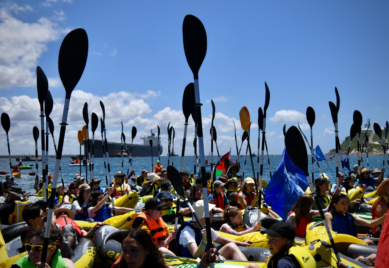 Courts, politicians and police in the sea: the many battles for climate activists at NSW’s Rising Tide protest - The Guardian