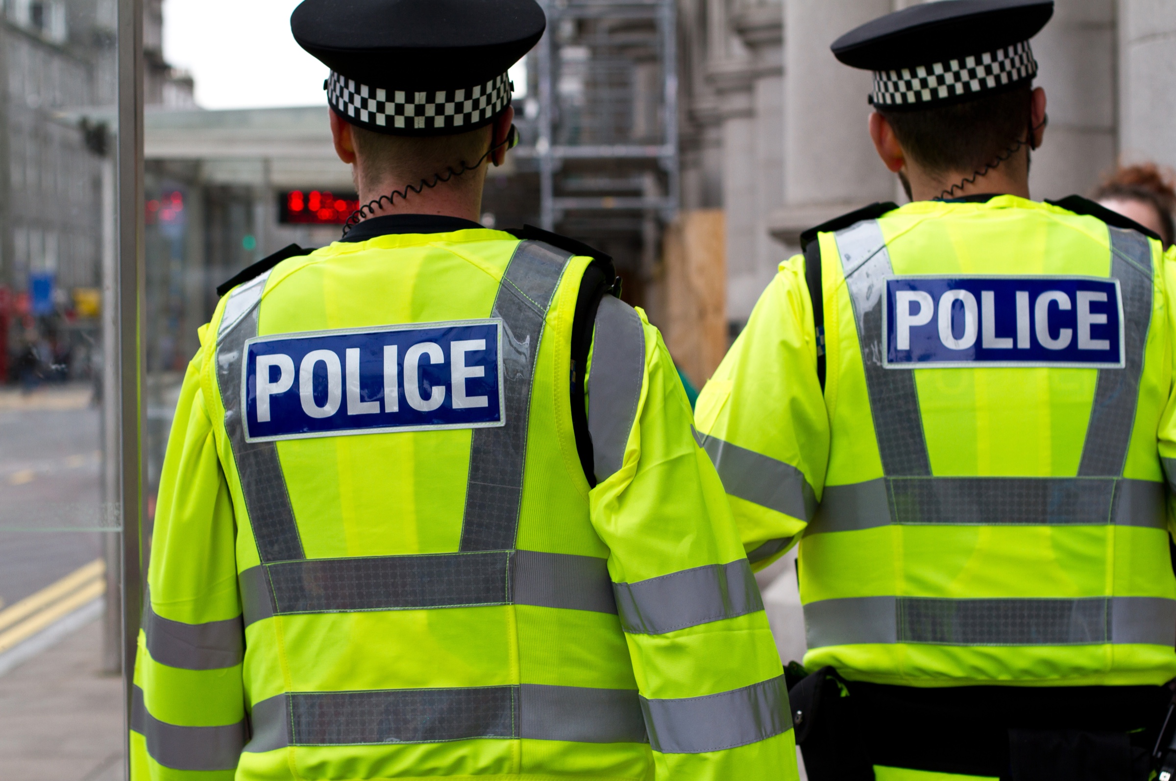 Two uniformed police officers on patrol