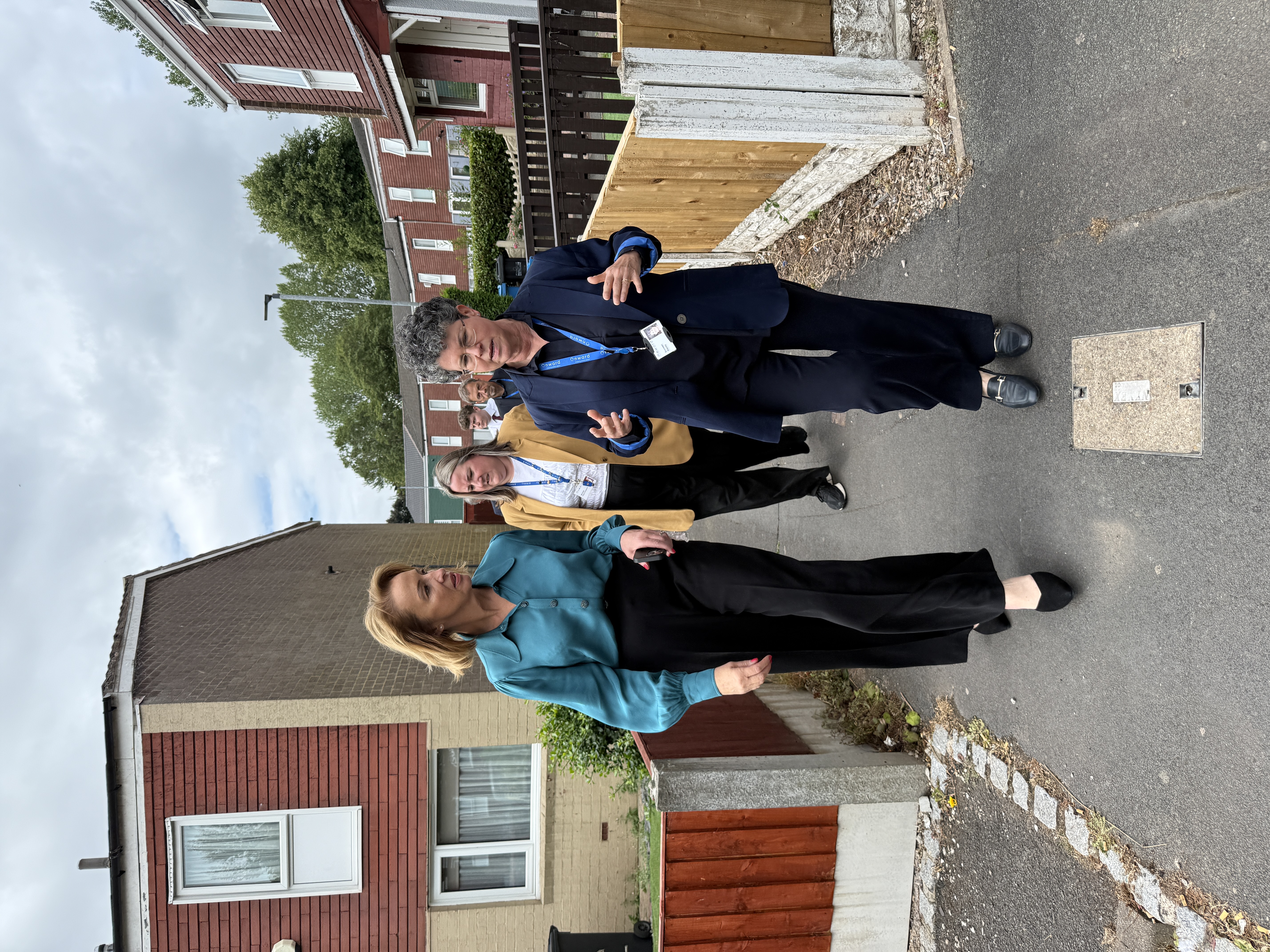 Sarah speaking with residents and local representatives