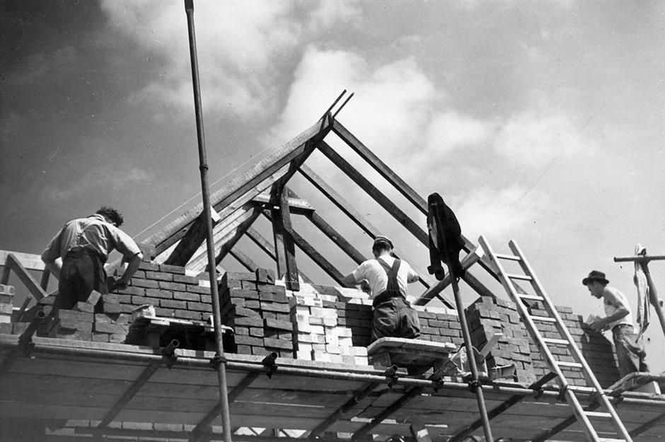 Bricklayers building a roof
