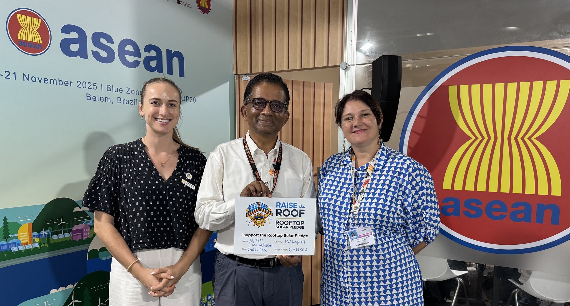 Nithi Nesadurai, Director CANSEA supports the Rooftop Solar Pledge with Charlie & Heidi