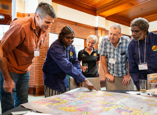 Marika Nungoray and Malcolm Uhl from Ngurra Kayanta IPA in remote WA show their IPA map at CNP Workshop. Photo: Paul Chapman. Marika Nungoray and Malcolm Uhl from Ngurra Kayanta IPA in remote WA show their IPA map at CNP Workshop. Photo: Paul Chapman.