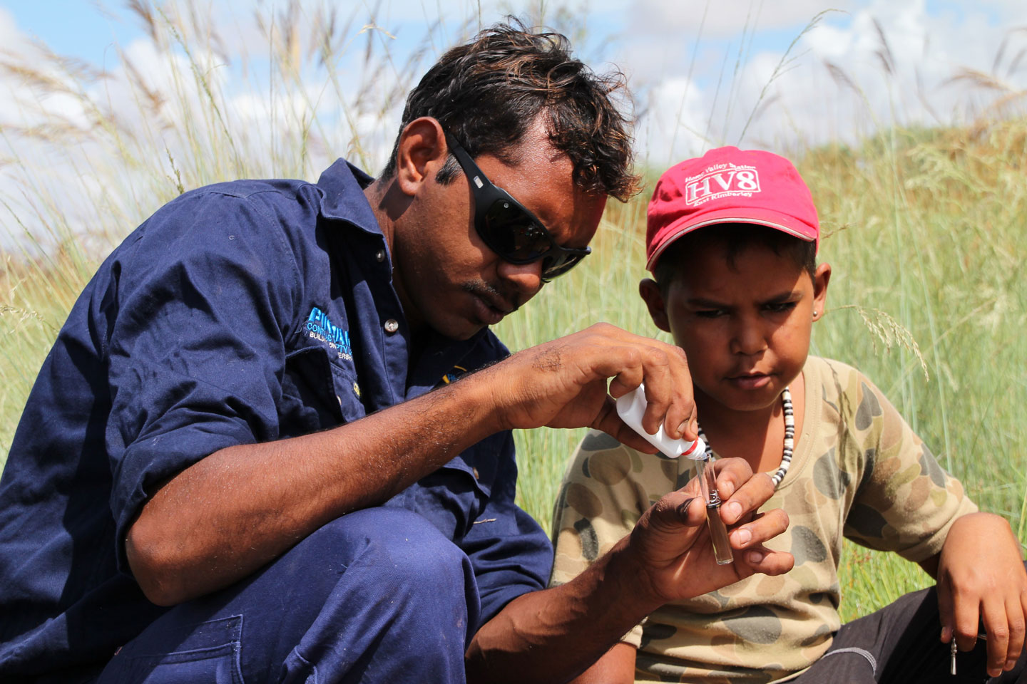 Ngurrara-Ranger-and-boy-Warlu-Jilajaa-Jumu-IPA.jpg