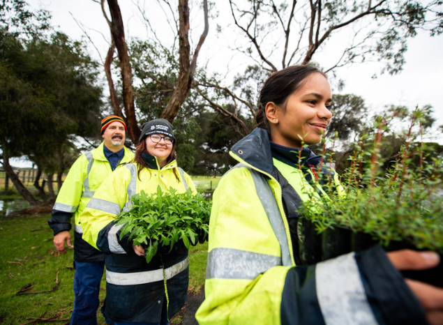 Budj Bim Rangers Heath Smith, Alyssa Dunstan and Lashay Blurton. Up to 10,000 plants are planted per year across Budj Bim. Photo: Annette Ruzicka.