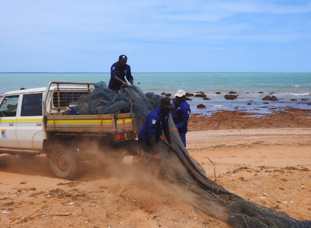 SE Arnhem Land Rangers Steven Ngalmi, Adam Mangurra & Clive Nunggarrgalu collecting ghost nets. Photo: Northern Land Council.