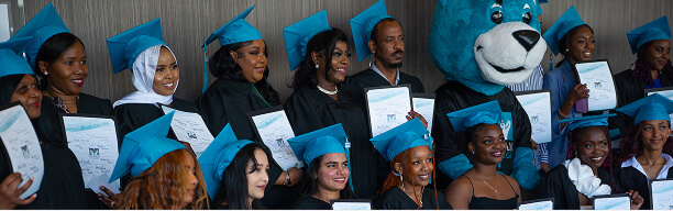 MaKami College graduates with mascot
