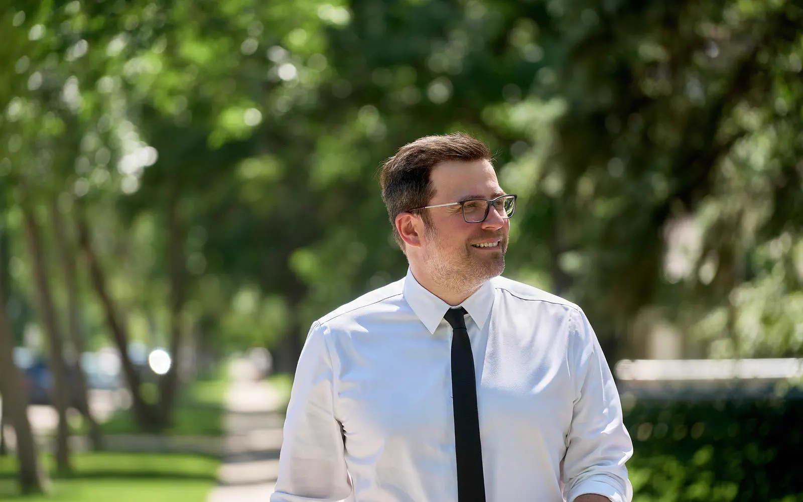 Tyler Crichton walking in a St. James park