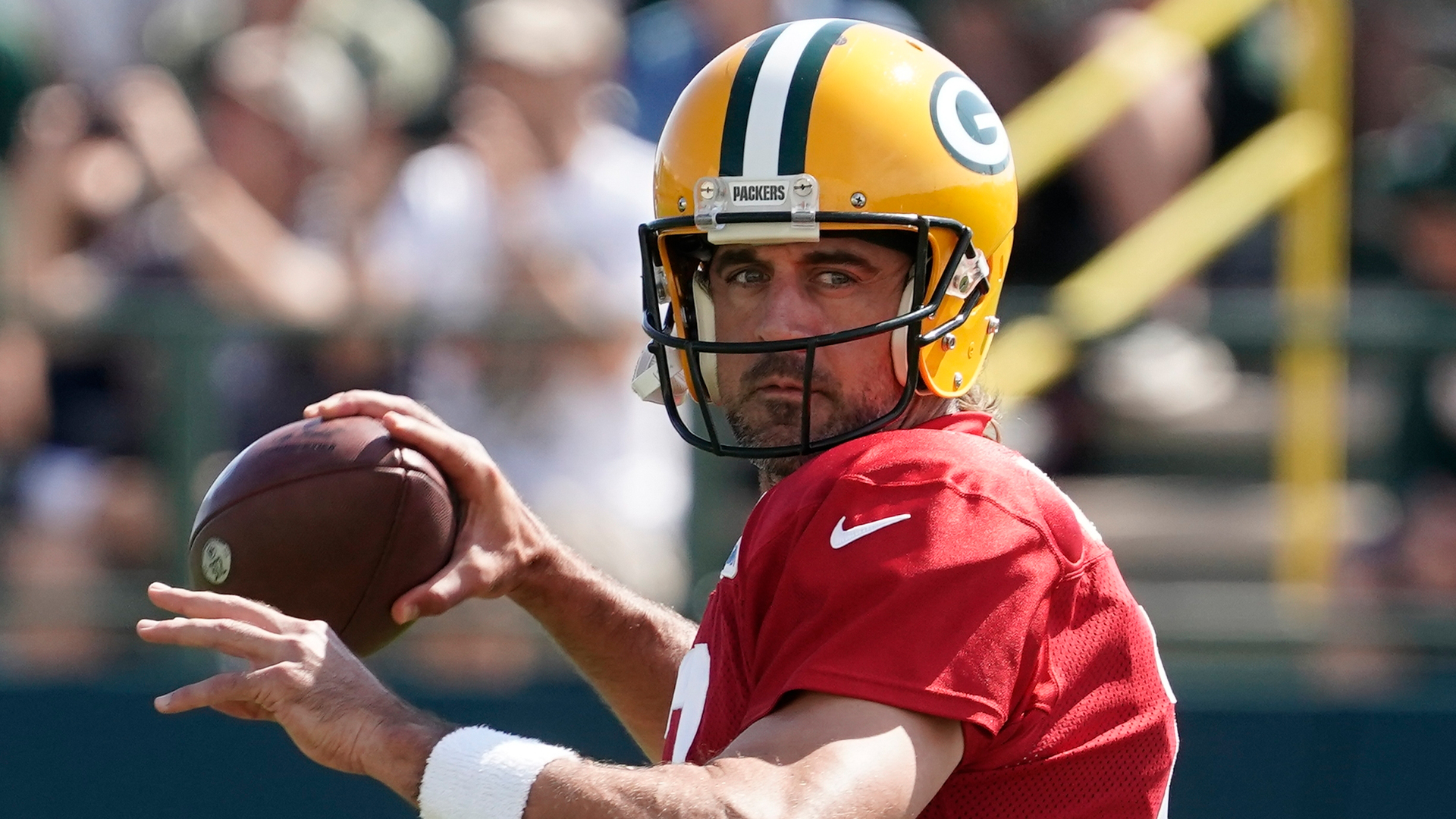 NFL quarterback Aaron Rodgers says journalists conducted a 'witch hunt' of unvaccinated athletes