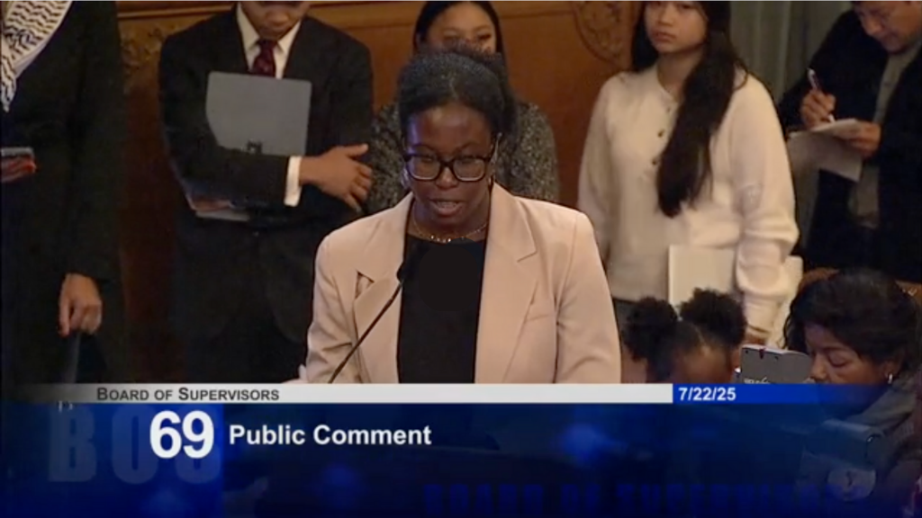 Law Center Intern Joy George makes a public comment at the SF Board of Supervisors Meeting about WOPA