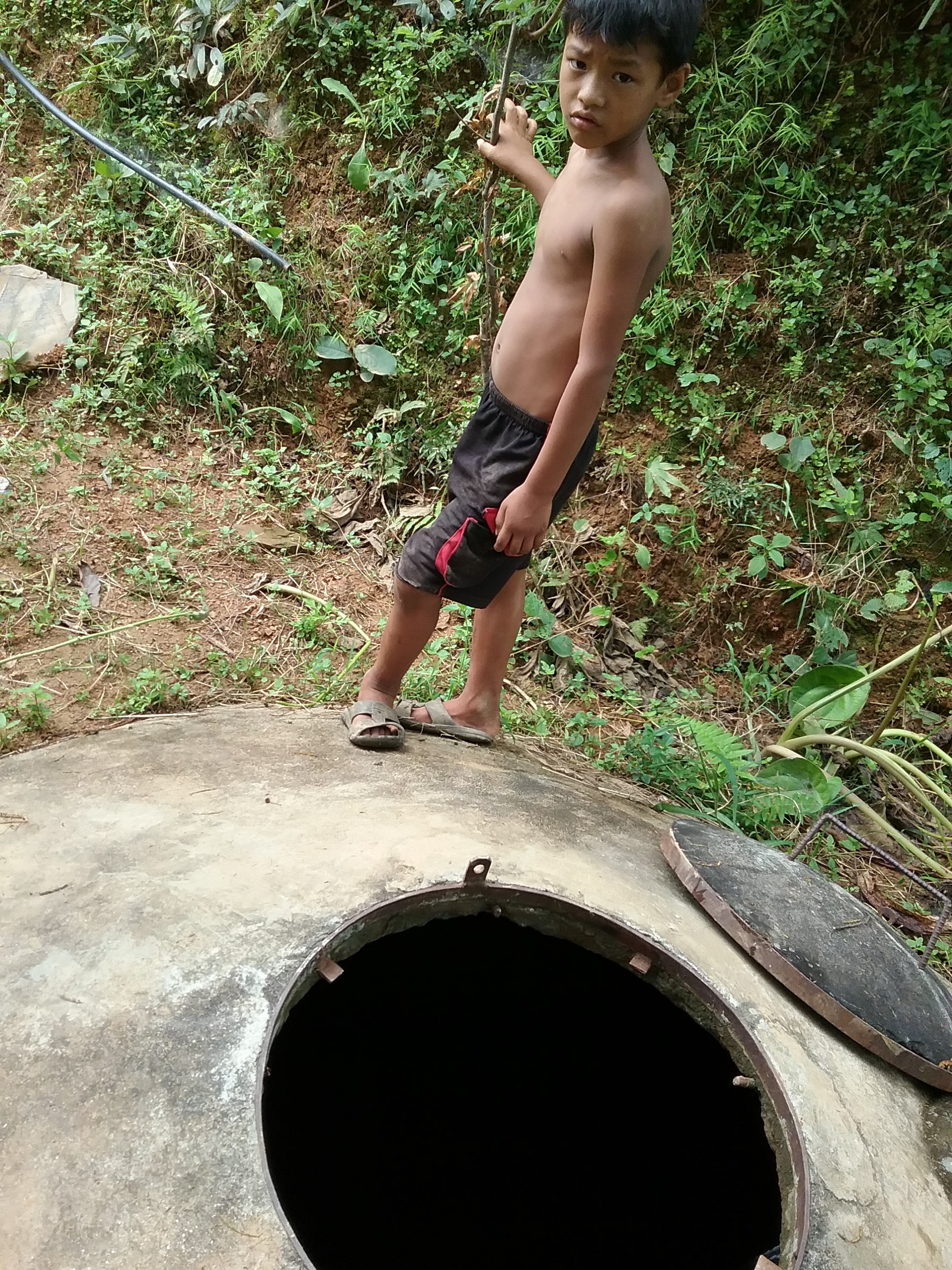 Water is pumped up to the original tank, which gravity-feeds clean water to the community