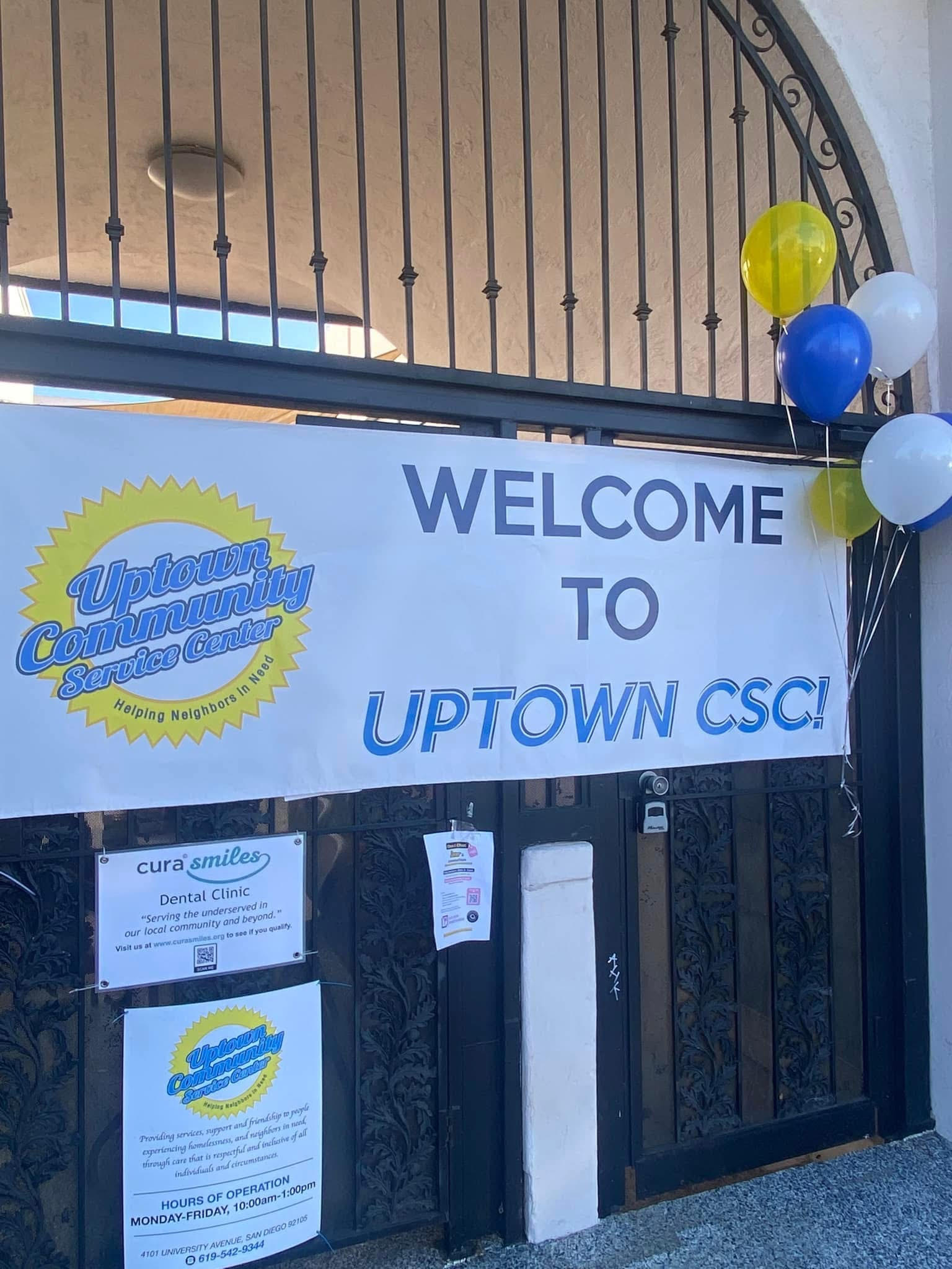 Uptown CSC entrance and sign with balloons