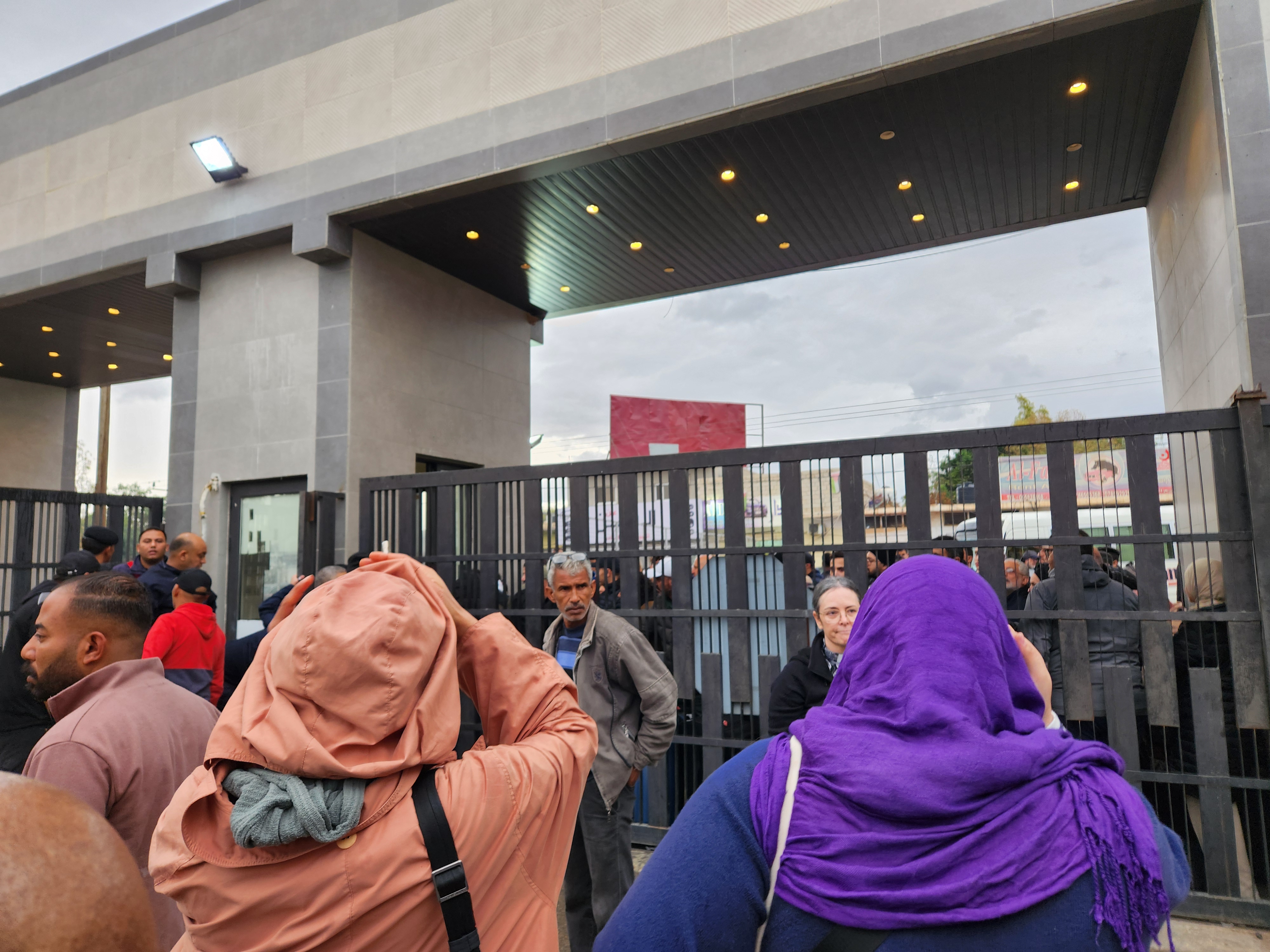 People at another section of militarized border crossing