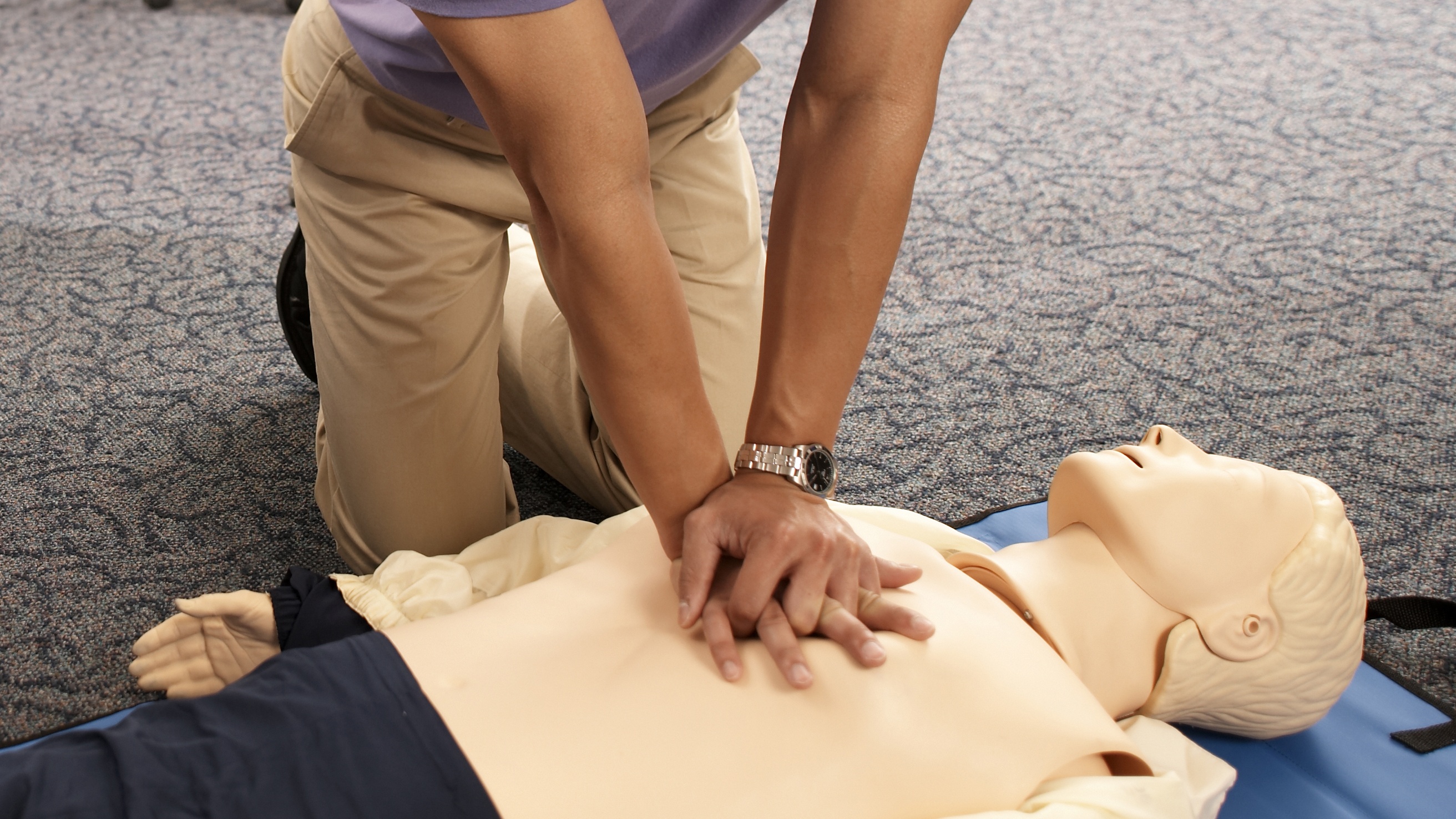 A man practicing CPR
